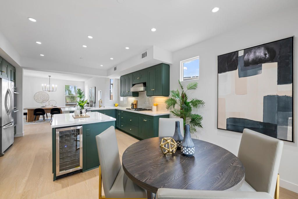 Dining room, Interior, Kitchen, Pendant Lights, Recessed Lighting, Stainless Steel Appliances, Wood Texture Flooring