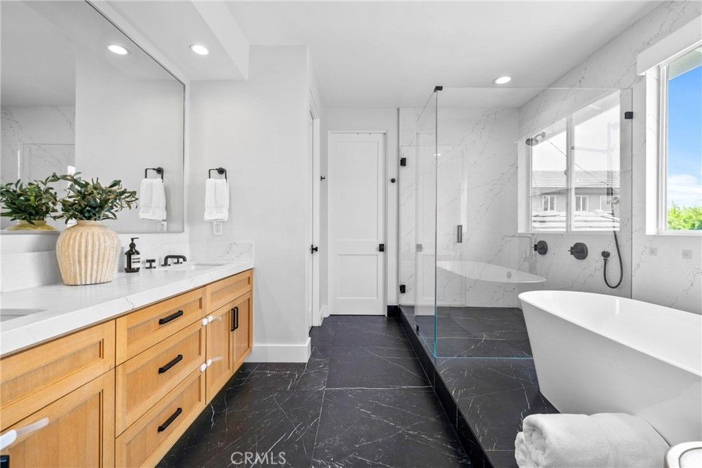 Bathroom, Dual Sink Vanities, Free Standing Baths, Glass Shower, Interior, Marble, Marble Walls, Recessed Lighting