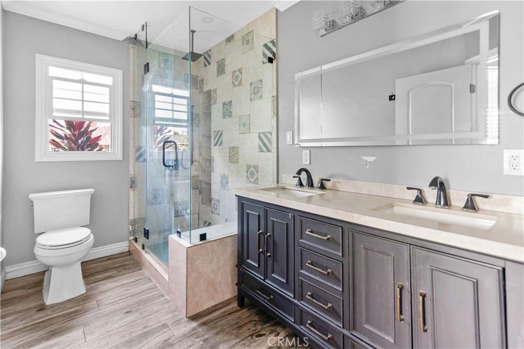 Bathroom, Dual Sink Vanities, Glass Shower, Interior, Wood Texture Flooring