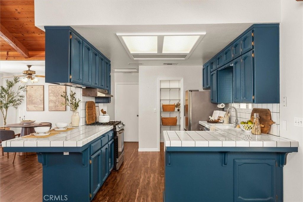 Interior, Kitchen, Tile Countertops, Wooden Ceilings, Wood Texture Flooring