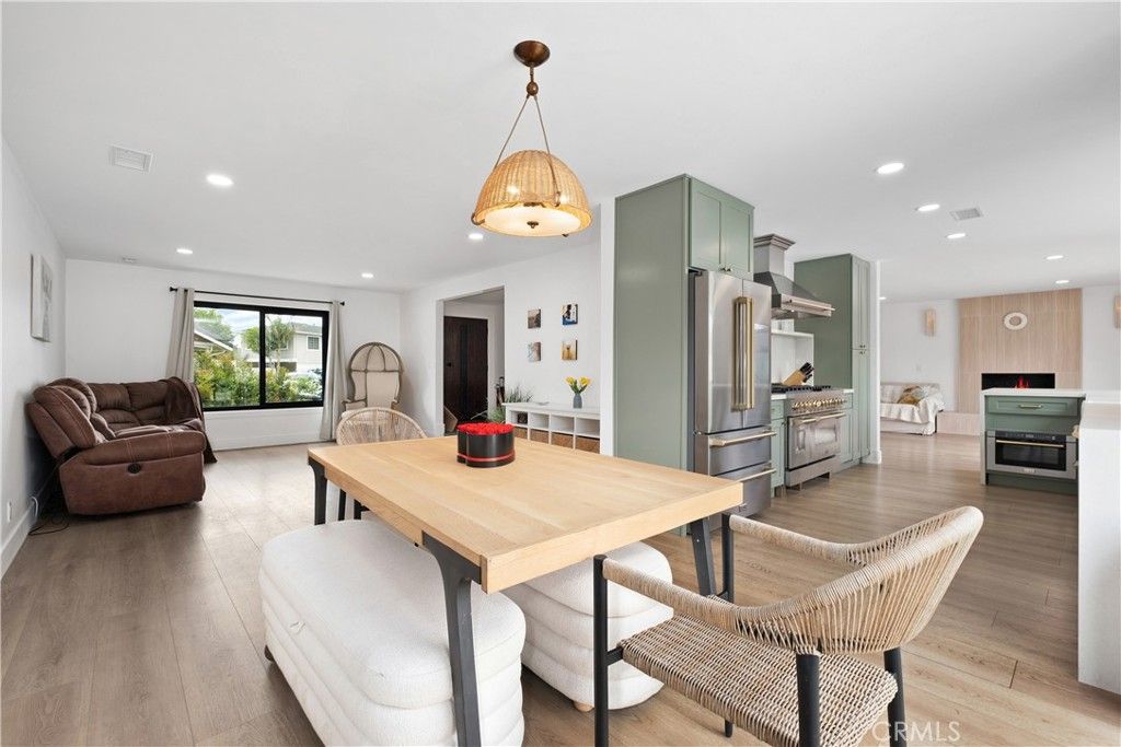 Dining room, Interior, Kitchen, Pendant Lights, Recessed Lighting, Stainless Steel Appliances, Wood Texture Flooring