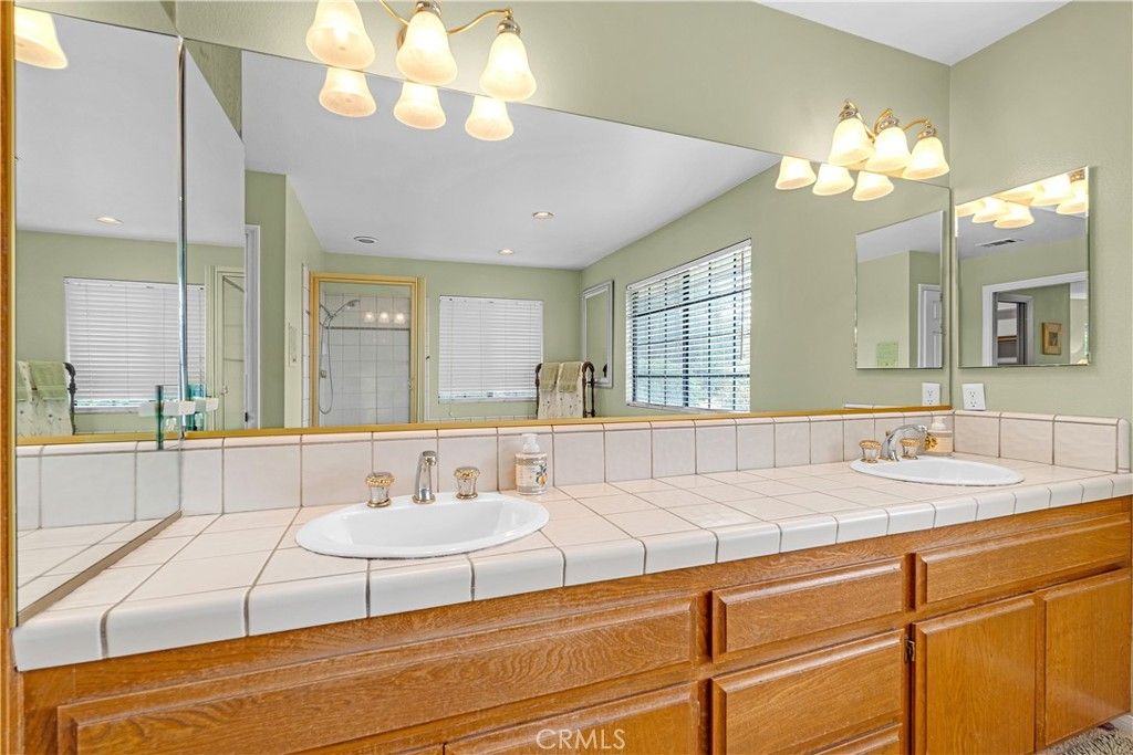 Bathroom, Dual Sink Vanities, Glass Shower, Interior, Recessed Lighting, Tile Countertops