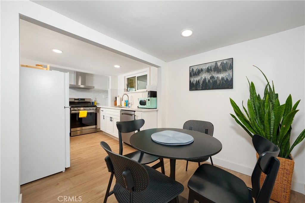 Dining room, Interior, Kitchen, Recessed Lighting, Stainless Steel Appliances, Wood Texture Flooring