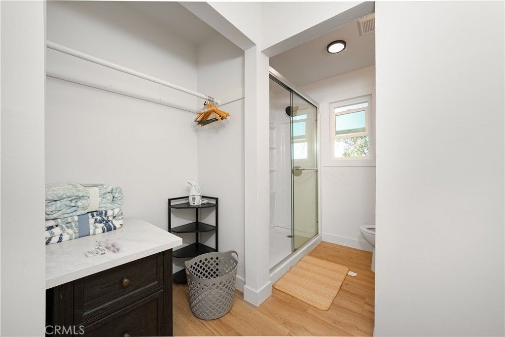 Bathroom, Glass Shower, Interior, Recessed Lighting, Wood Texture Flooring