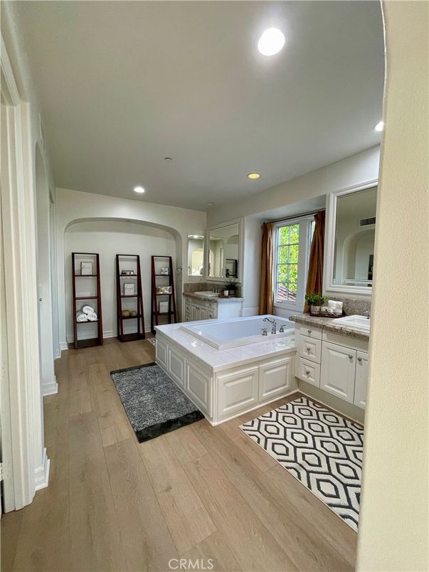 Bathroom, Dual Sink Vanities, Interior, Recessed Lighting, Wood Texture Flooring