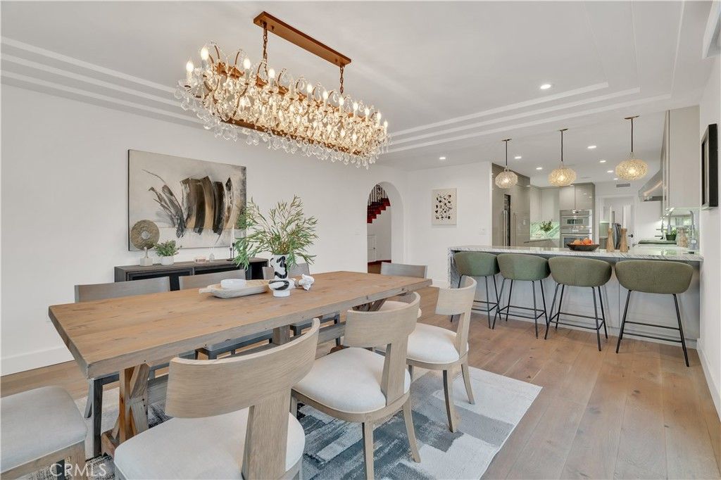 Chandelier, Dining room, Interior, Kitchen, Pendant Lights, Recessed Lighting, Stainless Steel Appliances, Wood Texture Flooring