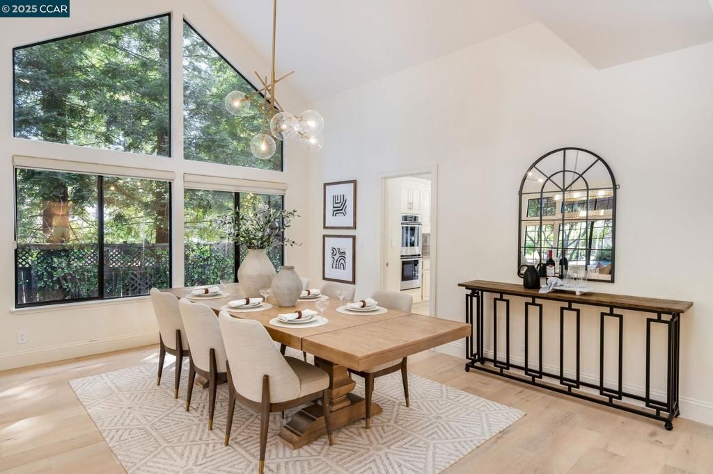 Dining room, Interior, Pendant Lights, Stainless Steel Appliances, Wood Texture Flooring