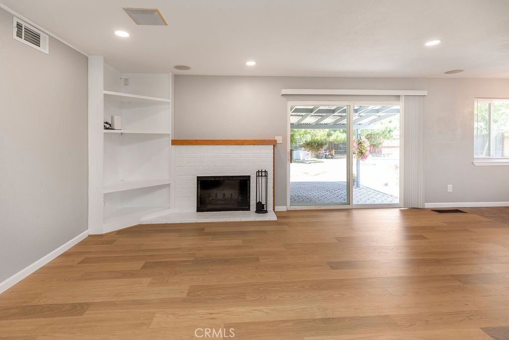 Empty room, Fireplace, Interior, Recessed Lighting, Wood Texture Flooring