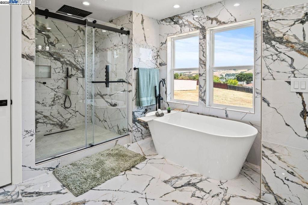 Bathroom, Free Standing Baths, Glass Shower, Interior, Marble, Marble Walls, Recessed Lighting