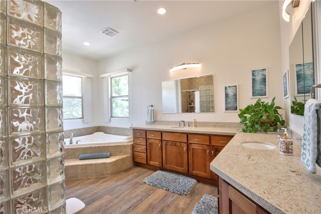Bathroom, Dual Sink Vanities, Interior, Recessed Lighting, Wood Texture Flooring