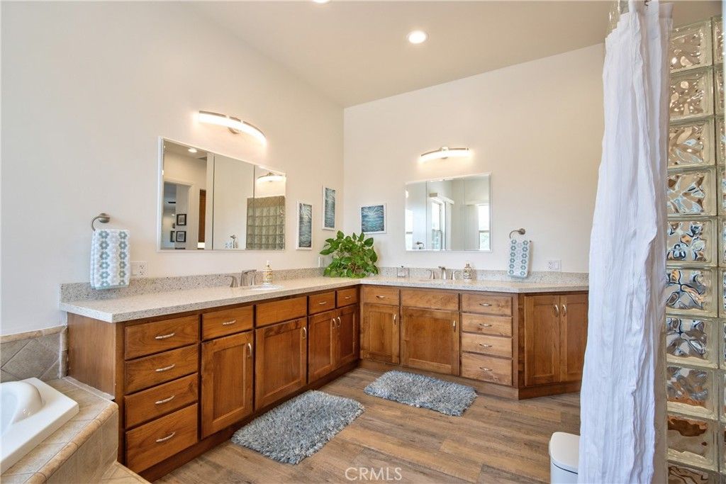 Bathroom, Dual Sink Vanities, Interior, Recessed Lighting, Wood Texture Flooring