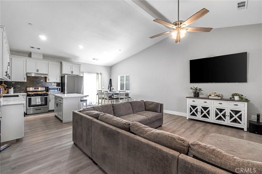Dining room, Interior, Kitchen, Living room, Recessed Lighting, Stainless Steel Appliances, Wood Texture Flooring