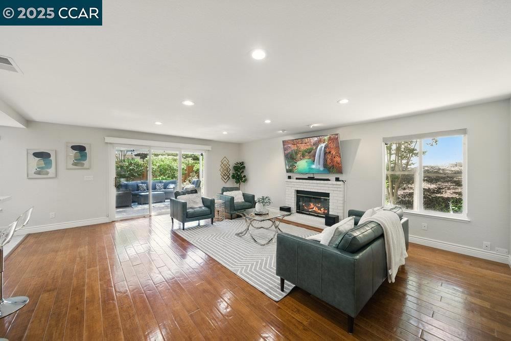 Fireplace, Interior, Living room, Recessed Lighting, Wood Texture Flooring