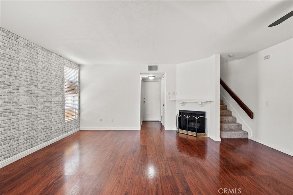 Empty room, Fireplace, Interior, Stone Walls, Wood Texture Flooring