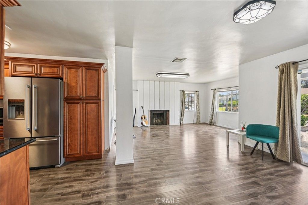 Fireplace, Interior, Kitchen, Stainless Steel Appliances, Wood Texture Flooring