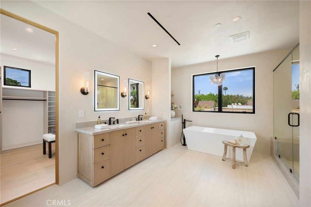 Bathroom, Dual Sink Vanities, Free Standing Baths, Glass Shower, Interior, Pendant Lights, Recessed Lighting, Wood Texture Flooring