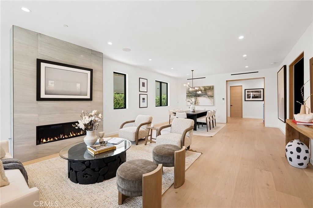 Dining room, Fireplace, Interior, Living room, Pendant Lights, Recessed Lighting, Wood Texture Flooring
