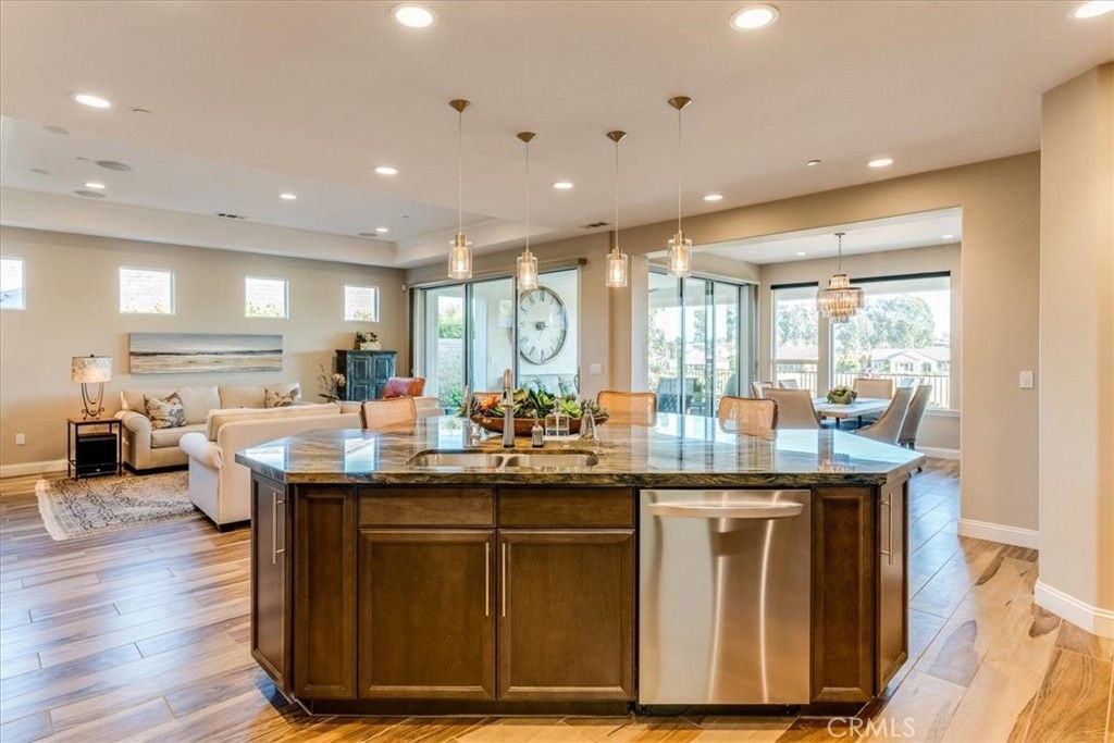 Dining room, Fireplace, Interior, Living room, Pendant Lights, Recessed Lighting, Wood Texture Flooring