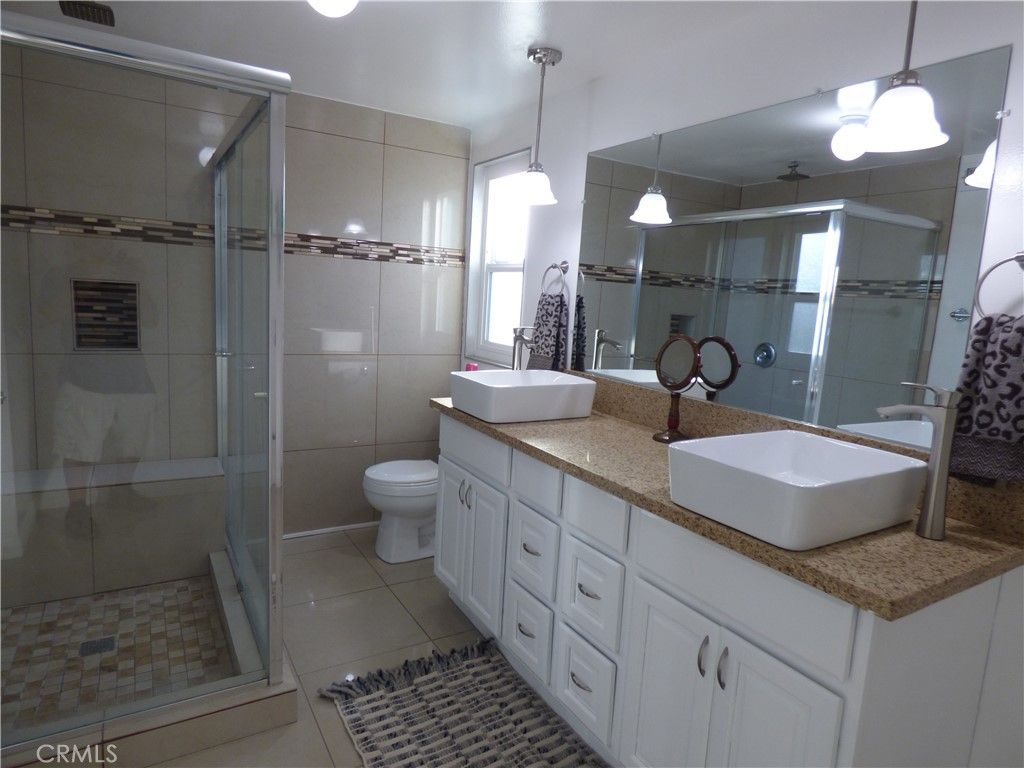 Bathroom, Dual Sink Vanities, Glass Shower, Interior, Pendant Lights