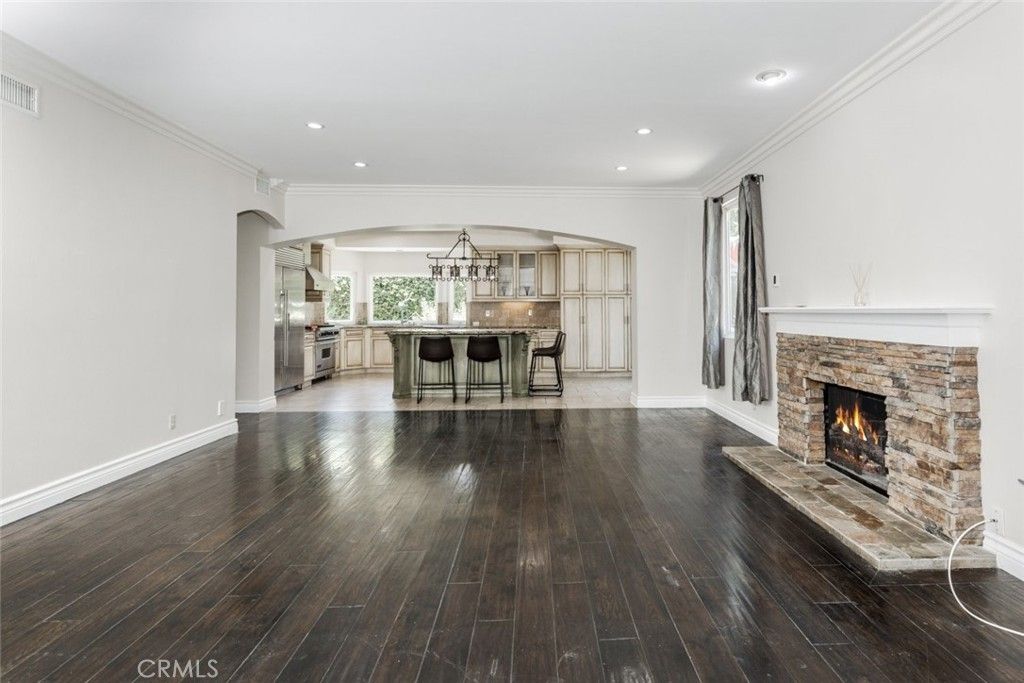 Empty room, Fireplace, Interior, Kitchen, Recessed Lighting, Wood Texture Flooring