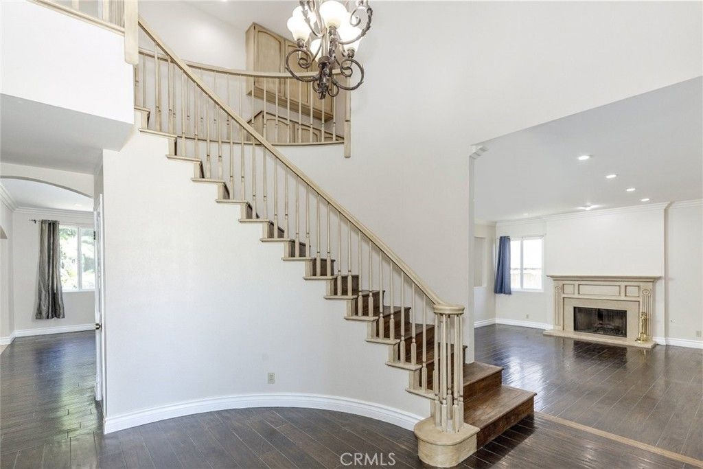 Chandelier, Fireplace, Interior, Recessed Lighting, Wood Texture Flooring