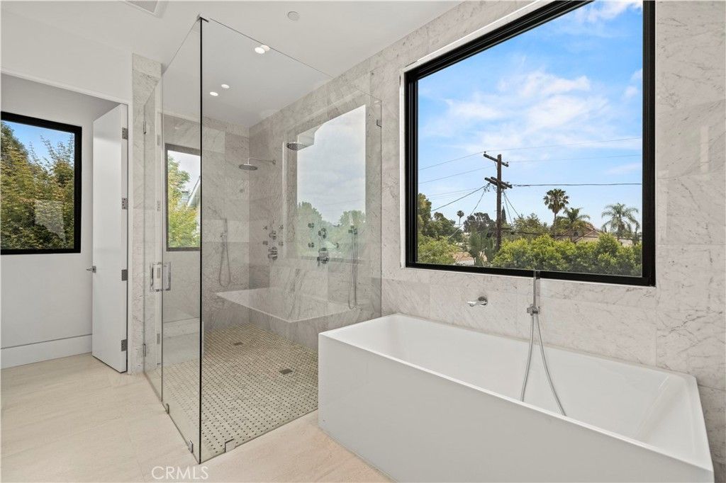 Bathroom, Free Standing Baths, Glass Shower, Interior, Marble Walls, Recessed Lighting