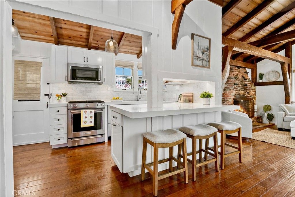 Fireplace, Interior, Kitchen, Pendant Lights, Stainless Steel Appliances, Wooden Beams, Wooden Ceilings, Wood Texture Flooring