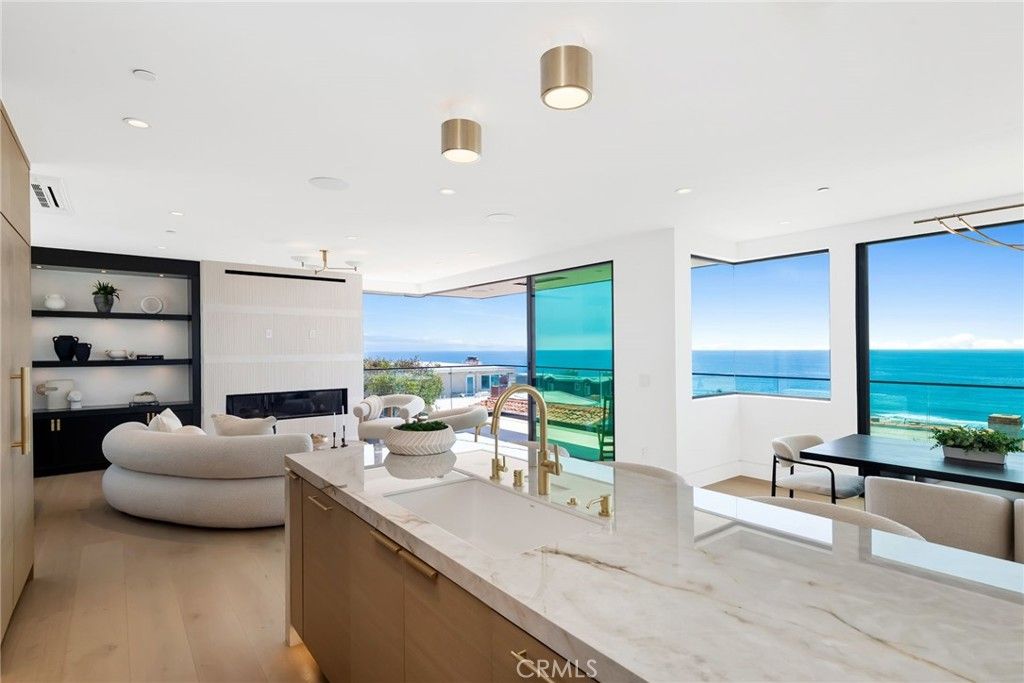 Fireplace, Interior, Kitchen, Living room, Pendant Lights, Recessed Lighting, Water, Wood Texture Flooring