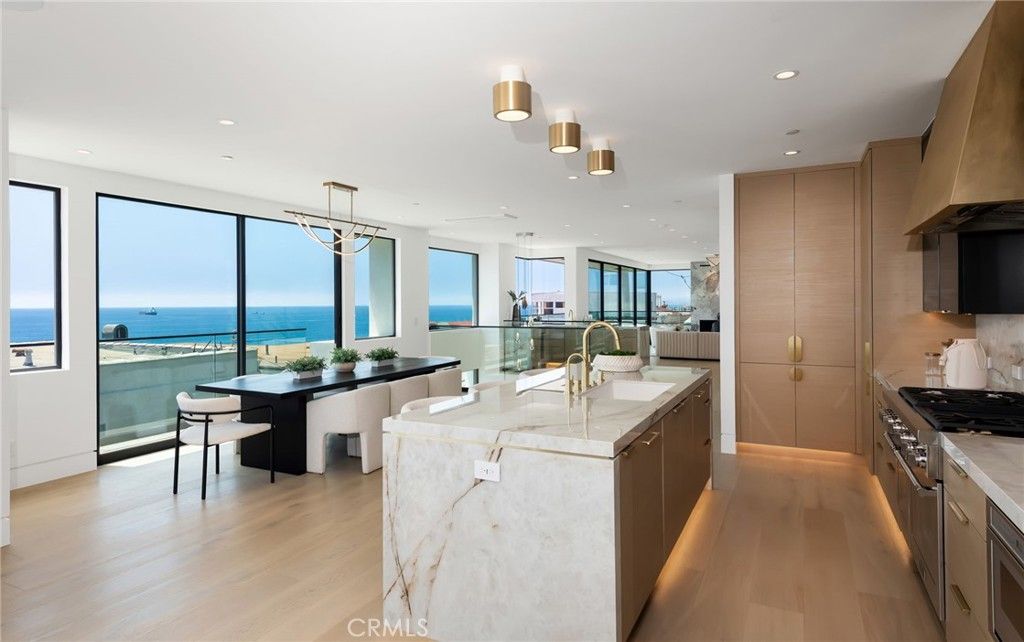 Dining room, Interior, Kitchen, Pendant Lights, Recessed Lighting, Stainless Steel Appliances, Water, Wood Texture Flooring