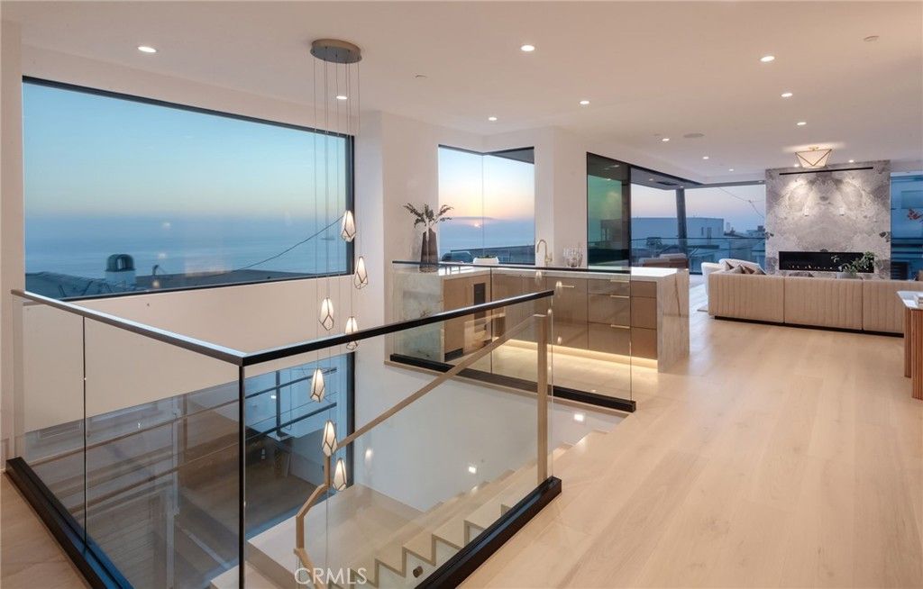 Fireplace, Interior, Living room, Pendant Lights, Recessed Lighting, Water, Wood Texture Flooring