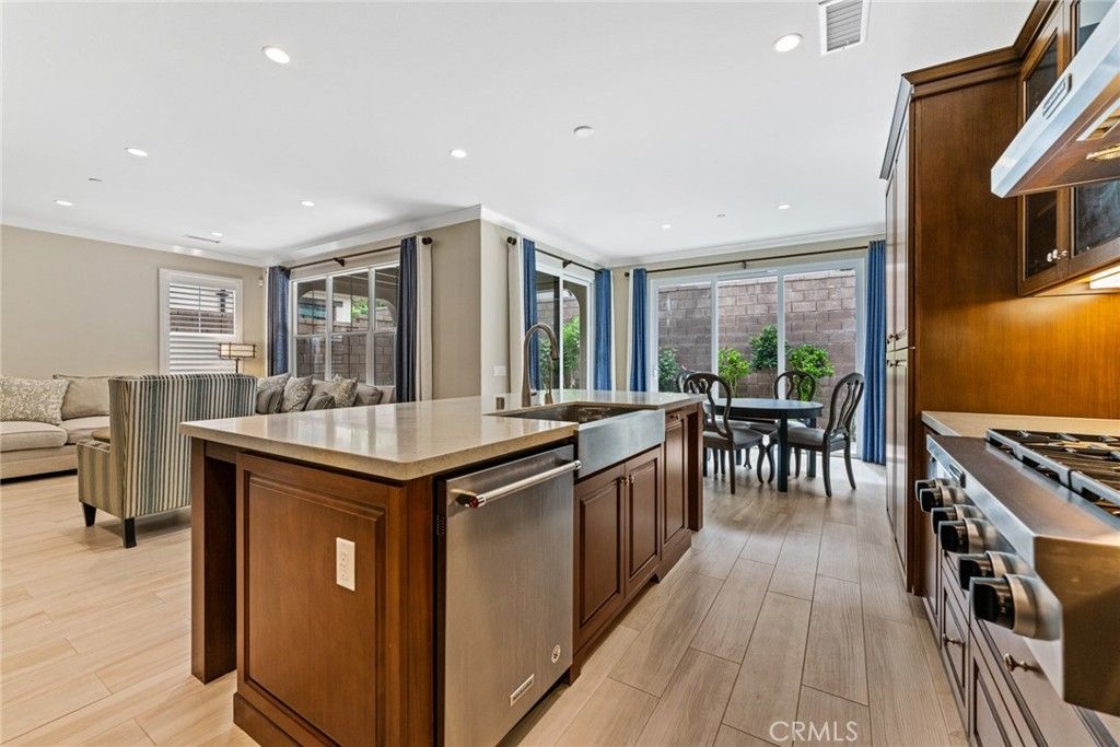 Dining room, Interior, Kitchen, Recessed Lighting, Stainless Steel Appliances, Wood Texture Flooring