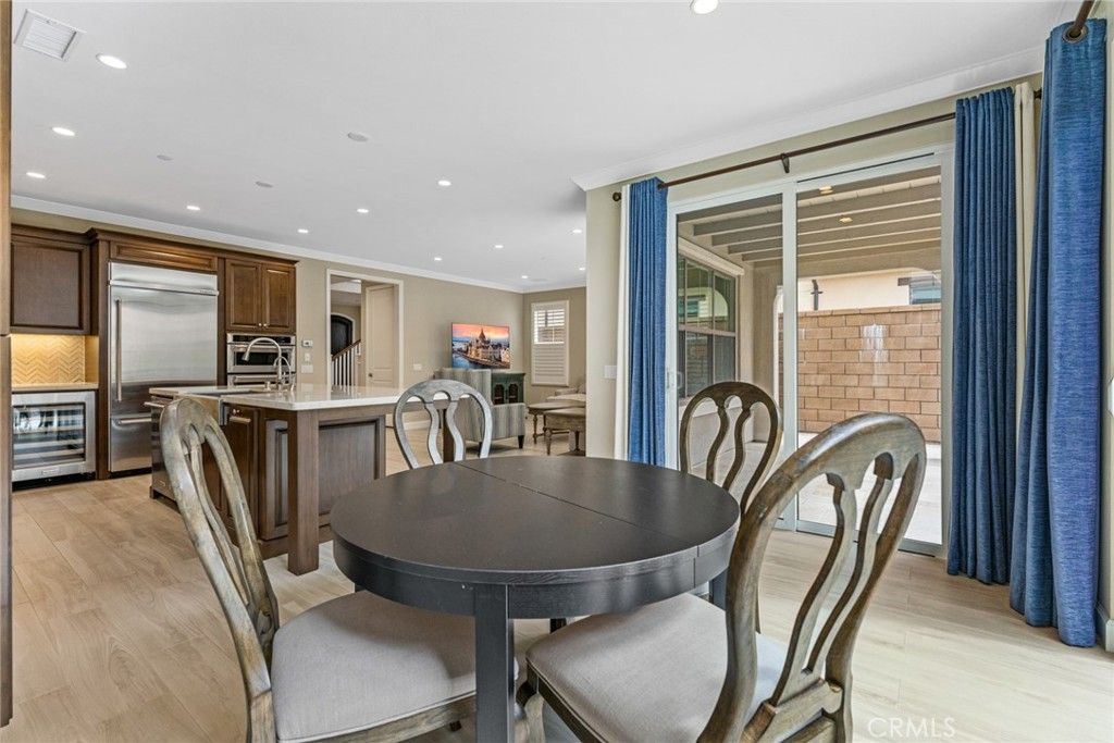 Dining room, Interior, Kitchen, Recessed Lighting, Stainless Steel Appliances, Wood Texture Flooring