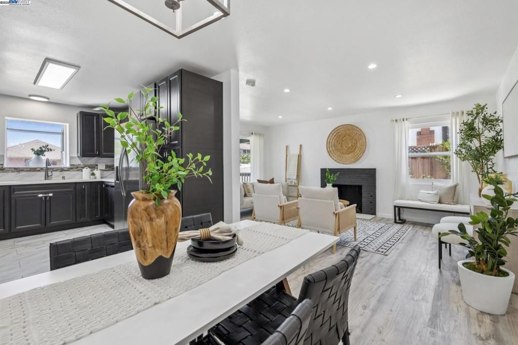 Dining room, Fireplace, Interior, Kitchen, Living room, Recessed Lighting, Wood Texture Flooring
