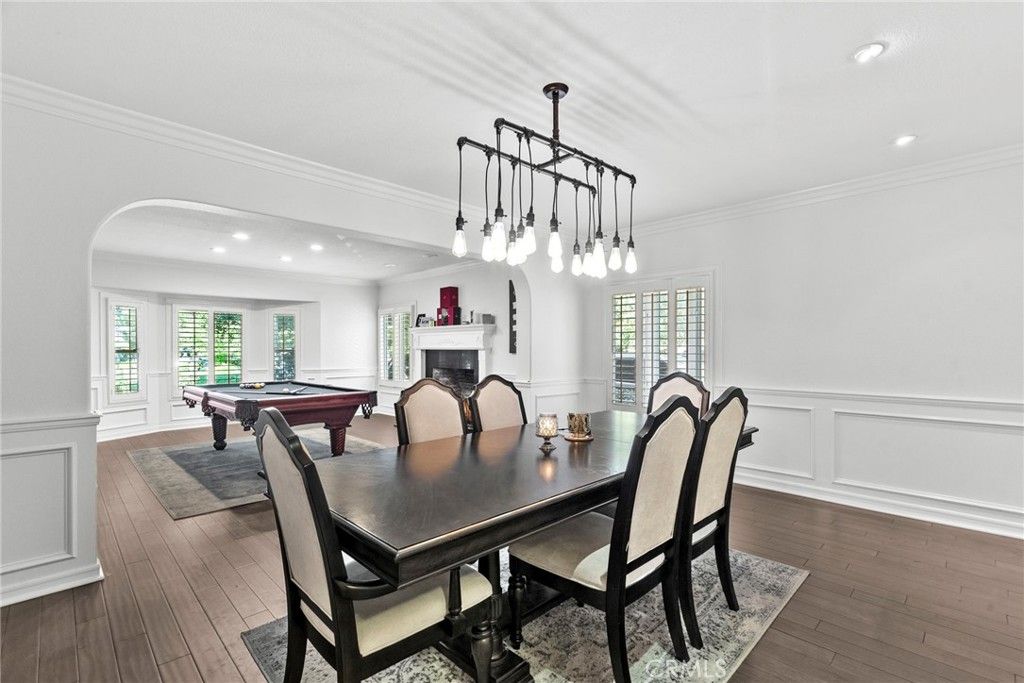 Billiard Table, Dining room, Fireplace, Game Room, Interior, Pendant Lights, Recessed Lighting, Wood Texture Flooring