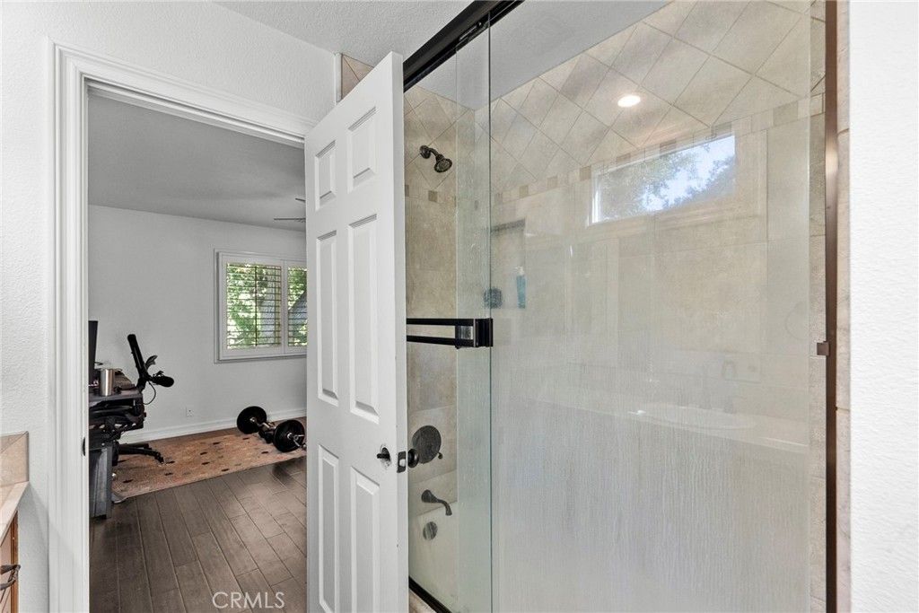 Bathroom, Fitness Equipment, Glass Shower, Interior, Recessed Lighting, Wood Texture Flooring