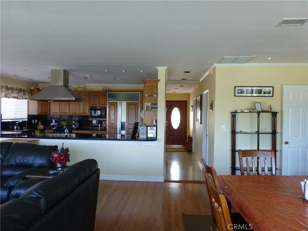 Dining room, Interior, Kitchen, Recessed Lighting, Stainless Steel Appliances, Wood Texture Flooring