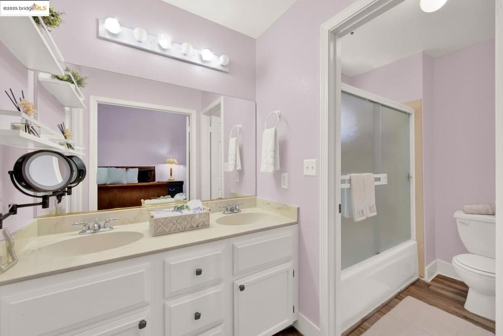 Bathroom, Dual Sink Vanities, Glass Shower, Interior, Wood Texture Flooring