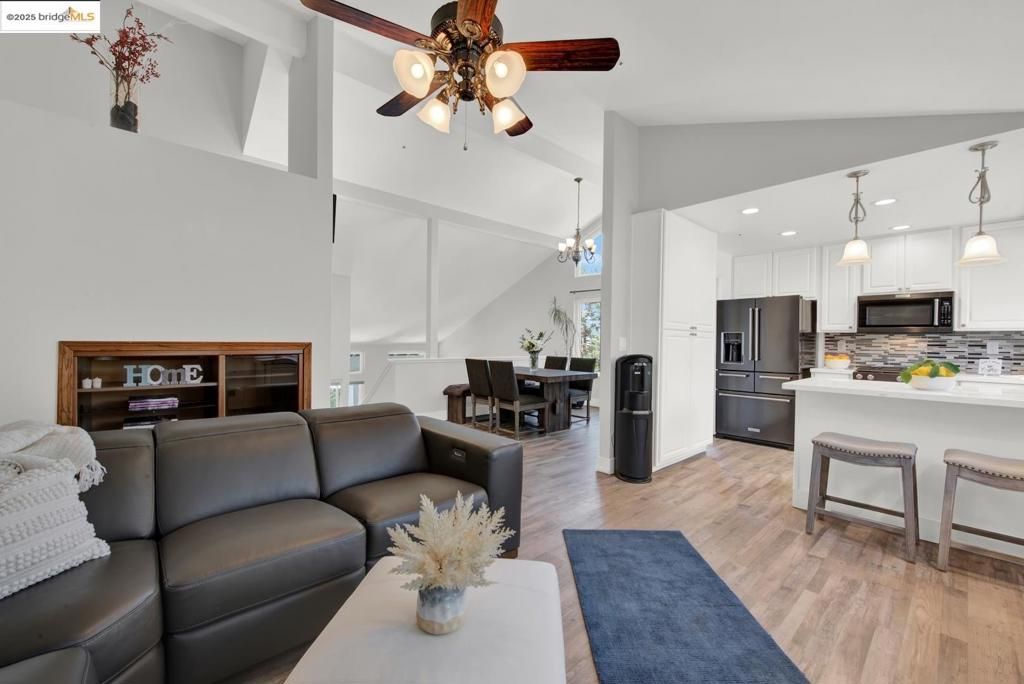 Dining room, Interior, Kitchen, Living room, Pendant Lights, Recessed Lighting, Stainless Steel Appliances, Wood Texture Flooring