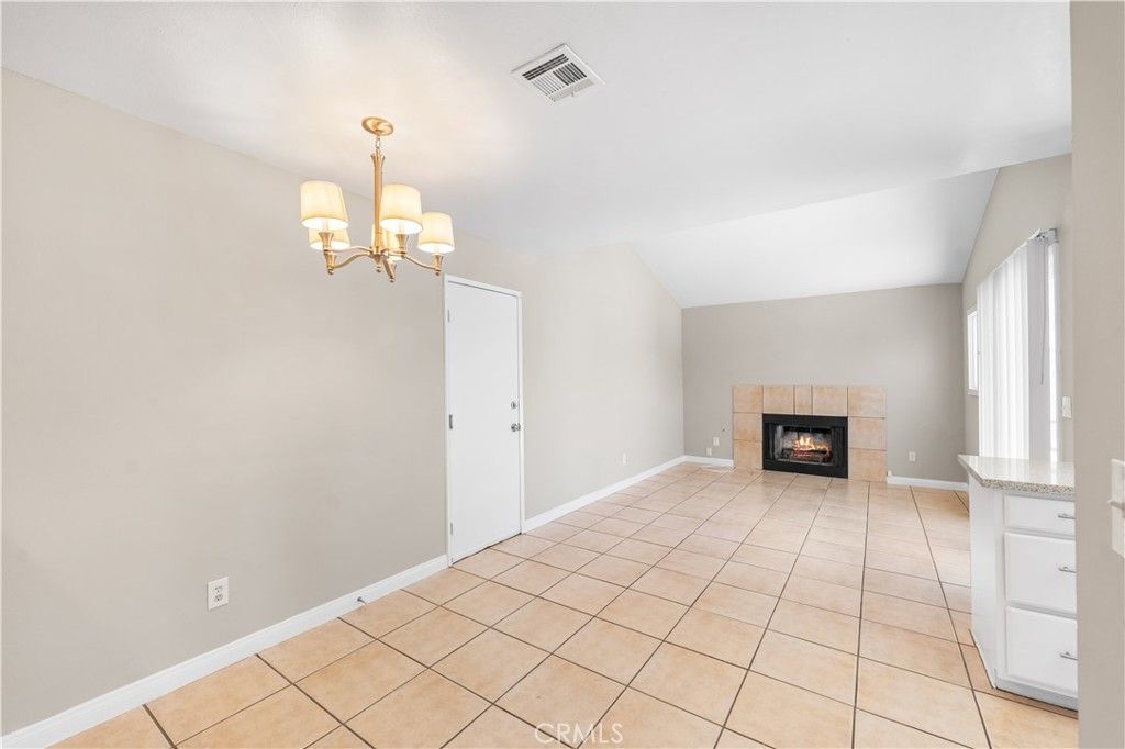 Chandelier, Empty room, Fireplace, Interior