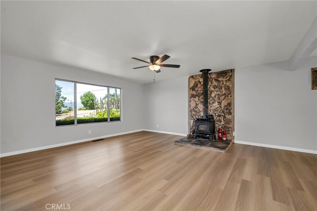 Empty room, Fireplace, Interior, Stone Walls, Wood Texture Flooring