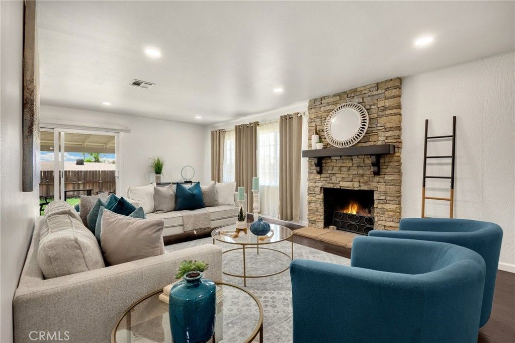 Fireplace, Interior, Living room, Recessed Lighting, Stone Walls, Wood Texture Flooring