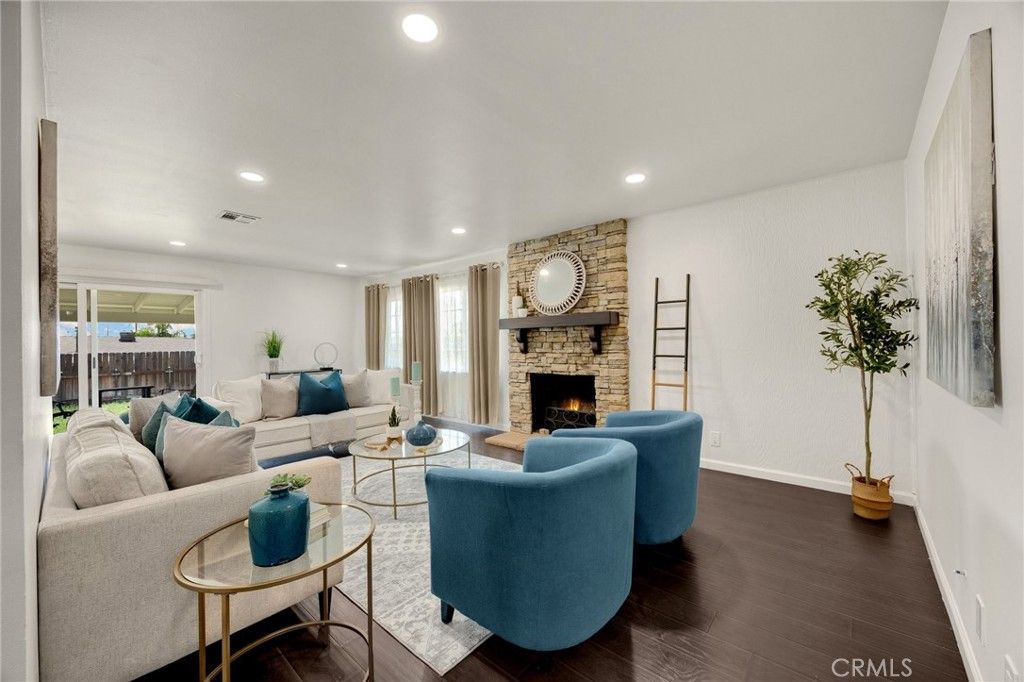 Fireplace, Interior, Living room, Recessed Lighting, Stone Walls, Wood Texture Flooring