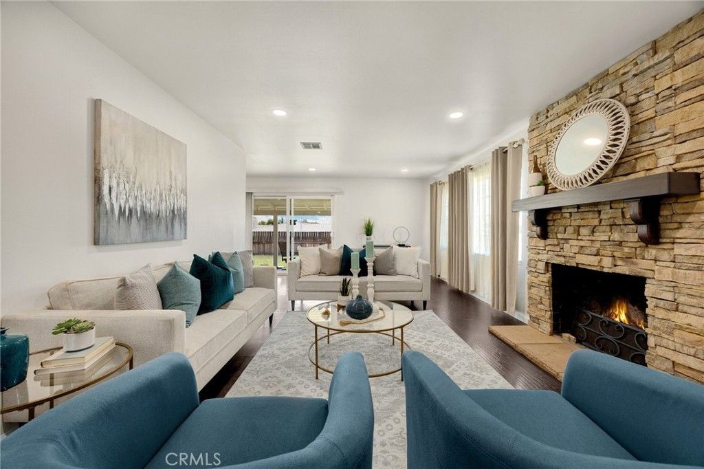 Fireplace, Interior, Living room, Recessed Lighting, Stone Walls, Wood Texture Flooring