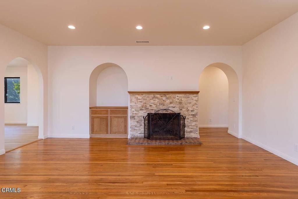 Empty room, Fireplace, Interior, Recessed Lighting, Wood Texture Flooring