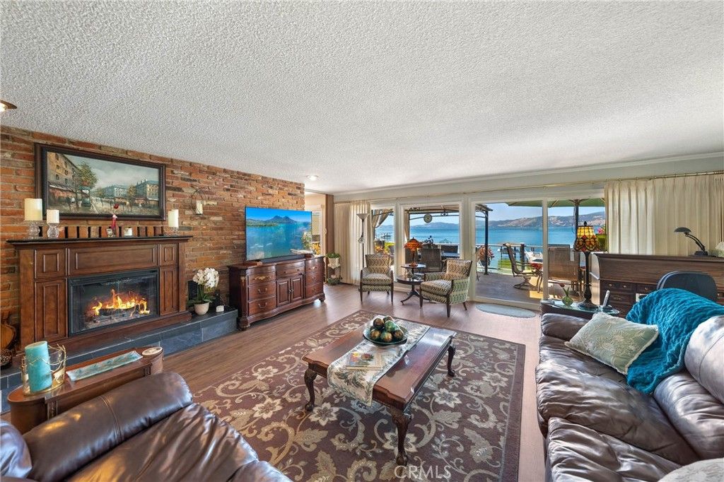 Fireplace, Interior, Living room, Stone Walls, Water, Wood Texture Flooring