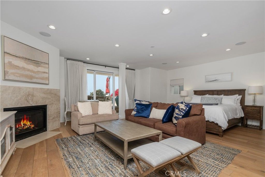 Bedroom, Fireplace, Interior, Living room, Recessed Lighting, Wood Texture Flooring