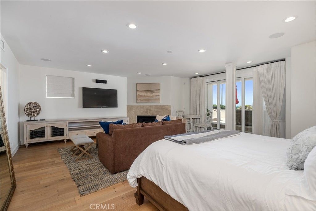 Bedroom, Fireplace, Interior, Recessed Lighting, Wood Texture Flooring