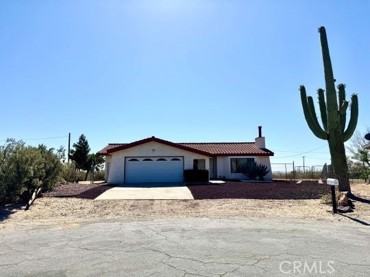 Attached, Backyard, Exterior, Facade, Spanish Mediterranean