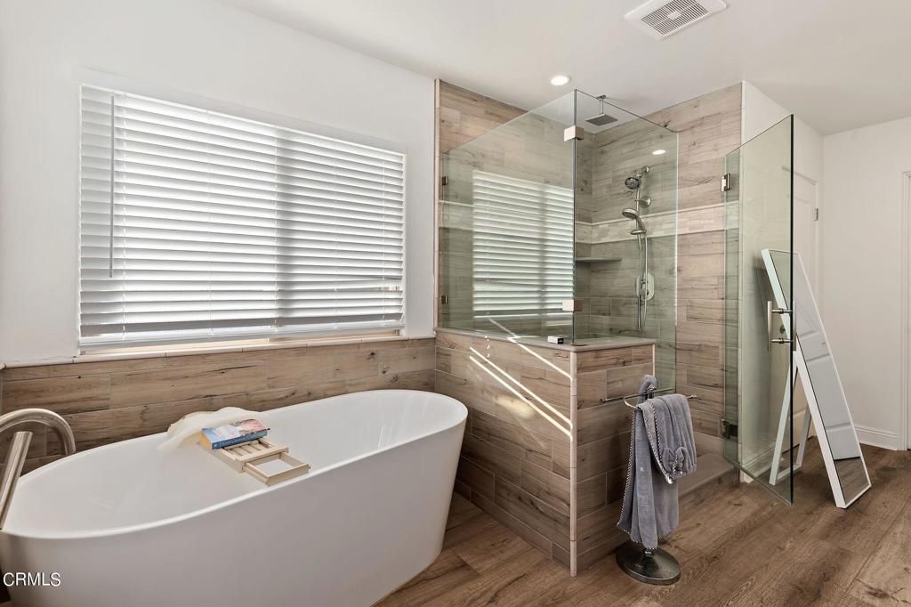 Bathroom, Free Standing Baths, Glass Shower, Interior, Recessed Lighting, Wood Texture Flooring