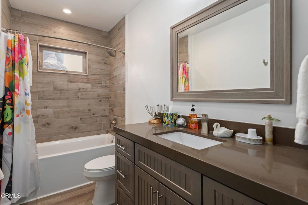 Bathroom, Dual Sink Vanities, Interior, Recessed Lighting, Wood Texture Flooring, Wooden Walls